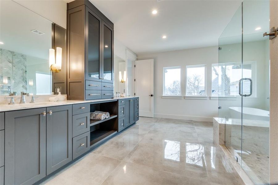 Bathroom featuring plus walk in shower and vanity