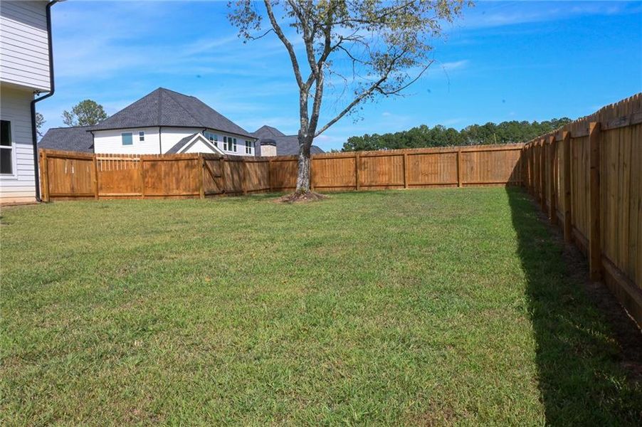 Exterior details and patio area of a home in , Loganville (Image 39).