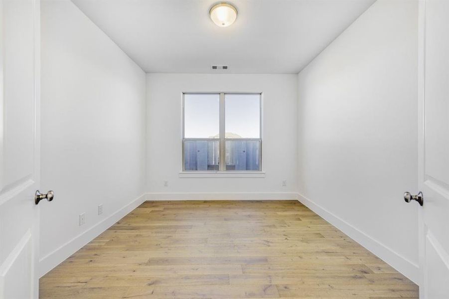 Spacious, unfurnished interior of a new home in Wellington, Haslet (Image 15).