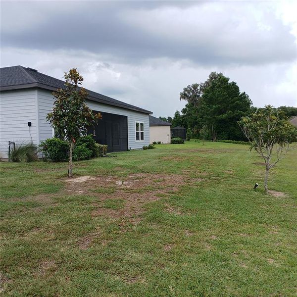 Exterior details and patio area of a home in Grand Park North, Dunnellon (Image 30). Exterior details and patio area of a home in Grand Park North, Dunnellon (Image 30).