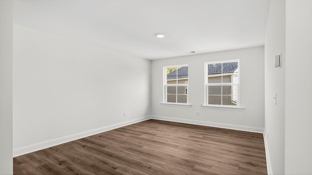 Spacious, unfurnished interior of a new home in Creekside at Andrews, Summerville (Image 18).
