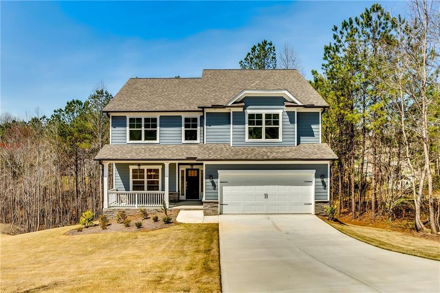 Front exterior of a new home in , Dallas, GA, highlighting curb appeal (Image 1).