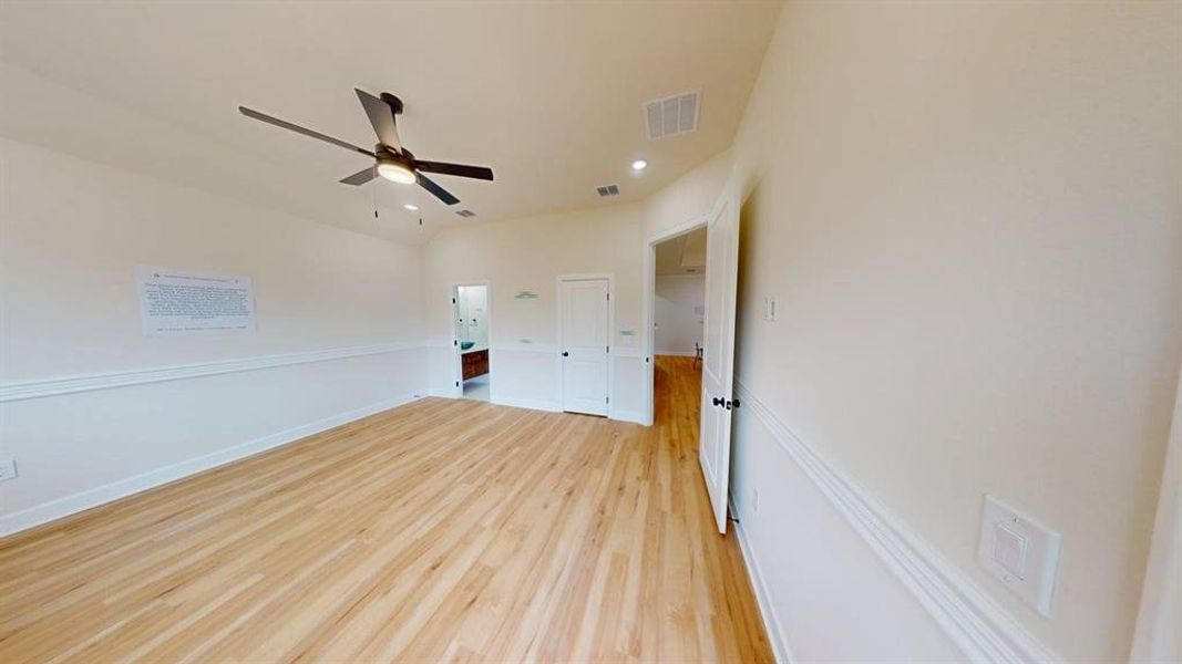 Room featuring light wood finished floors, a ceiling fan, and recessed lighting