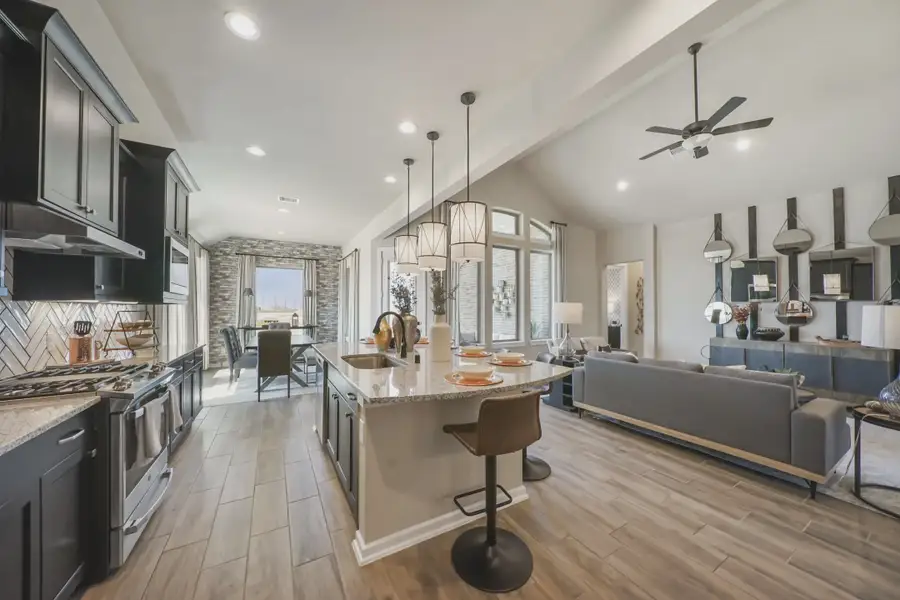 Representative furnished interior of a home built from the Bradford by Chesmar Homes in Meridiana 50's, Manvel (Image 7).