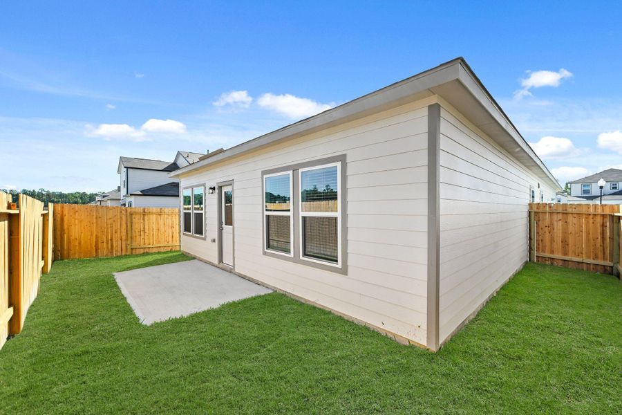Exterior details and patio area of a home in Northpark South, Porter (Image 16). Exterior details and patio area of a home in Northpark South, Porter (Image 16).