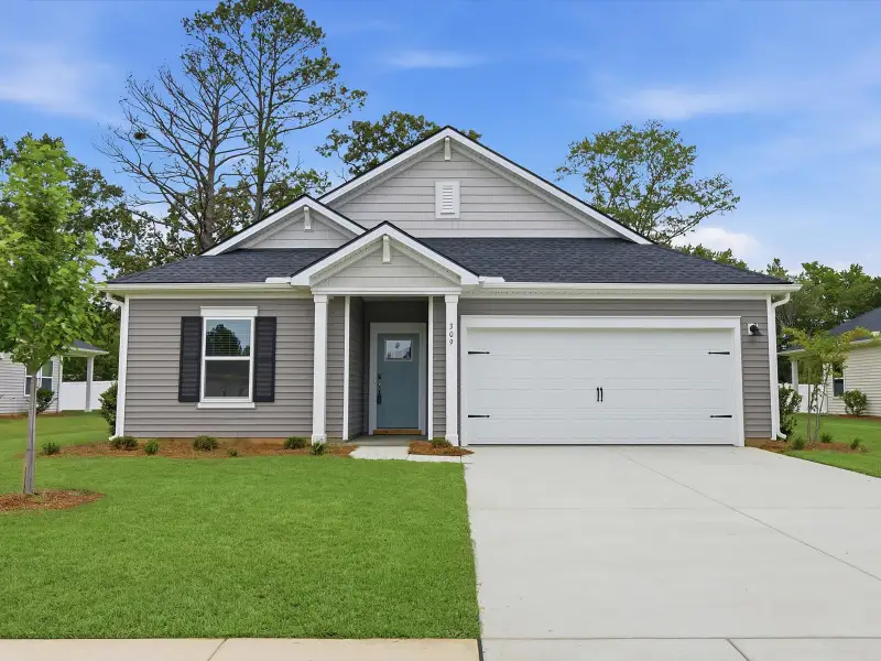 Front exterior of a new home in Palmetto Place, Longs, SC, highlighting curb appeal (Image 1). Front exterior of a new home in Palmetto Place, Longs, SC, highlighting curb appeal (Image 1).