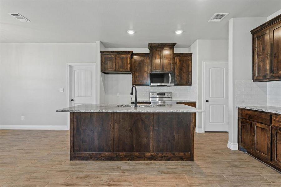 Furnished interior view inside a new home in , Granbury (Image 10).