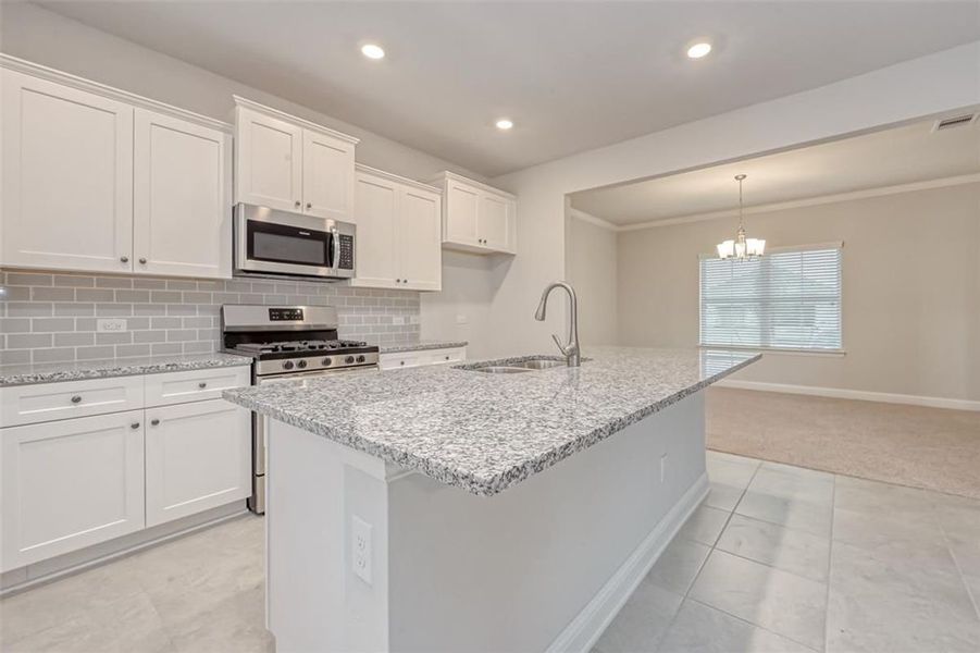 Representative furnished interior of a home built from the Plan 2500 by Adams Homes in The Bluffs at Lafayette, Freeport (Image 10).