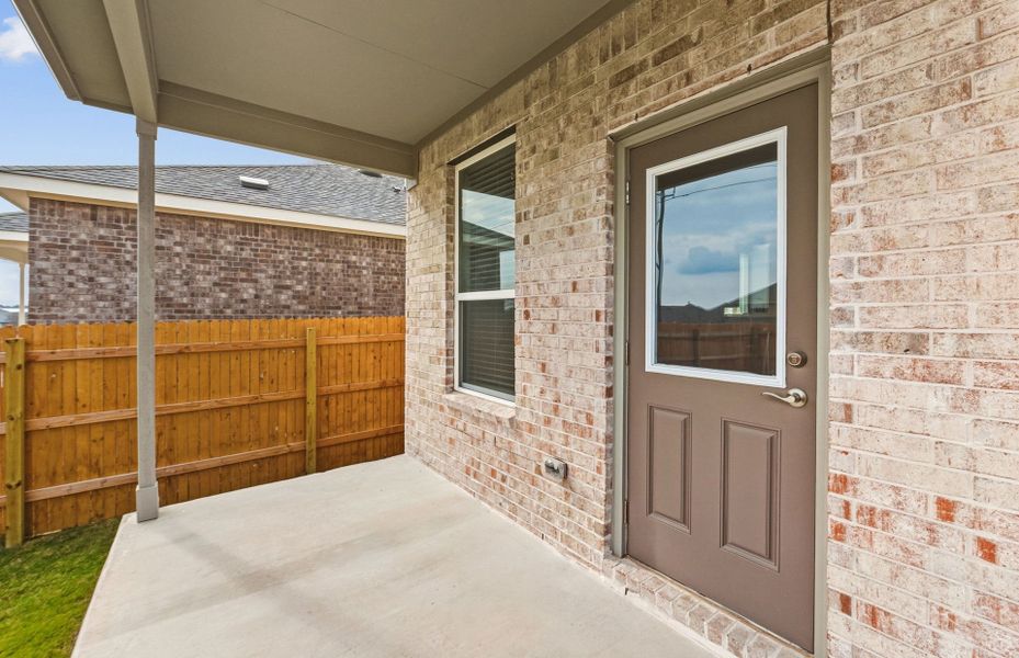 Exterior details and patio area of a home in Crosswinds, Kyle (Image 21).