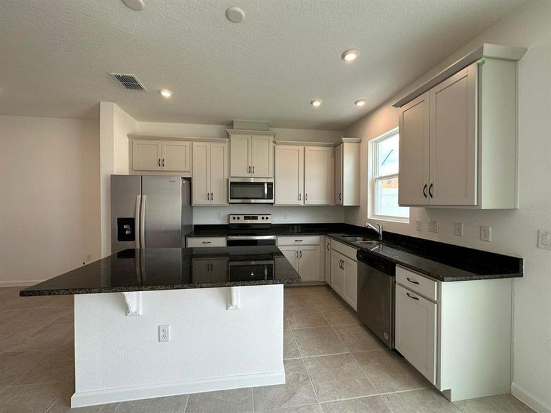 Furnished interior view inside a new home in , Kissimmee (Image 6).