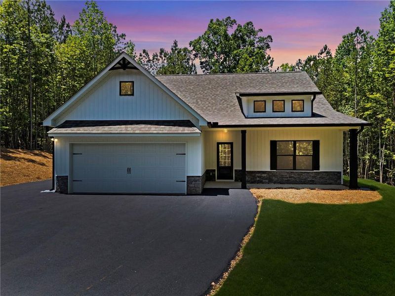 Front exterior of a new home in , Buchanan, GA, highlighting curb appeal (Image 2). Front exterior of a new home in , Buchanan, GA, highlighting curb appeal (Image 2).