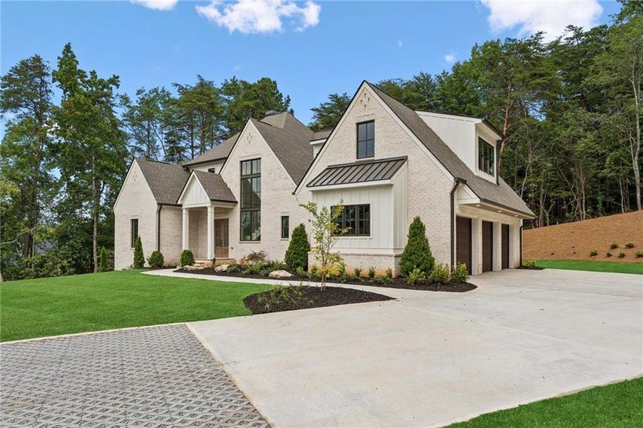 Front exterior of a new home in , Cumming, GA, highlighting curb appeal (Image 1).
