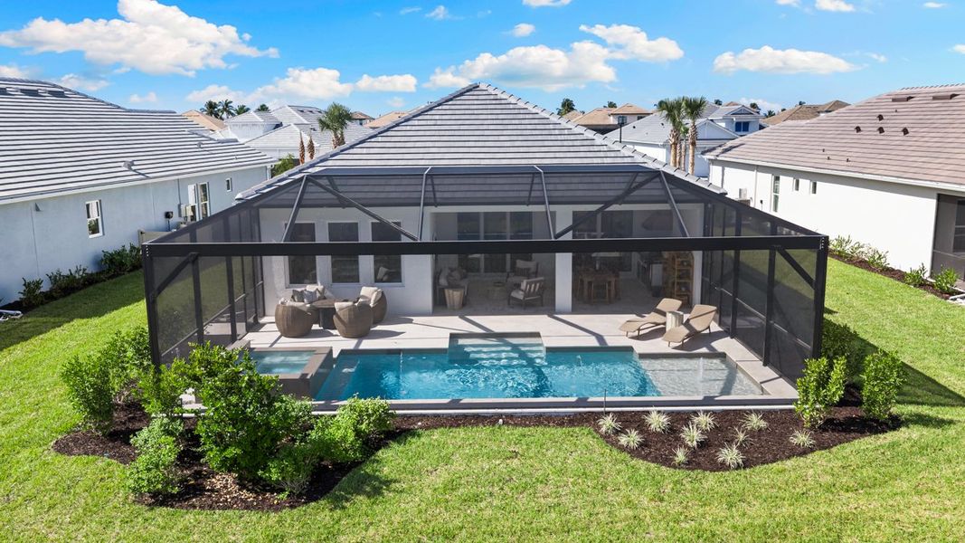 Exterior details and patio area of a home in Esplanade by the Islands, Naples (Image 21).