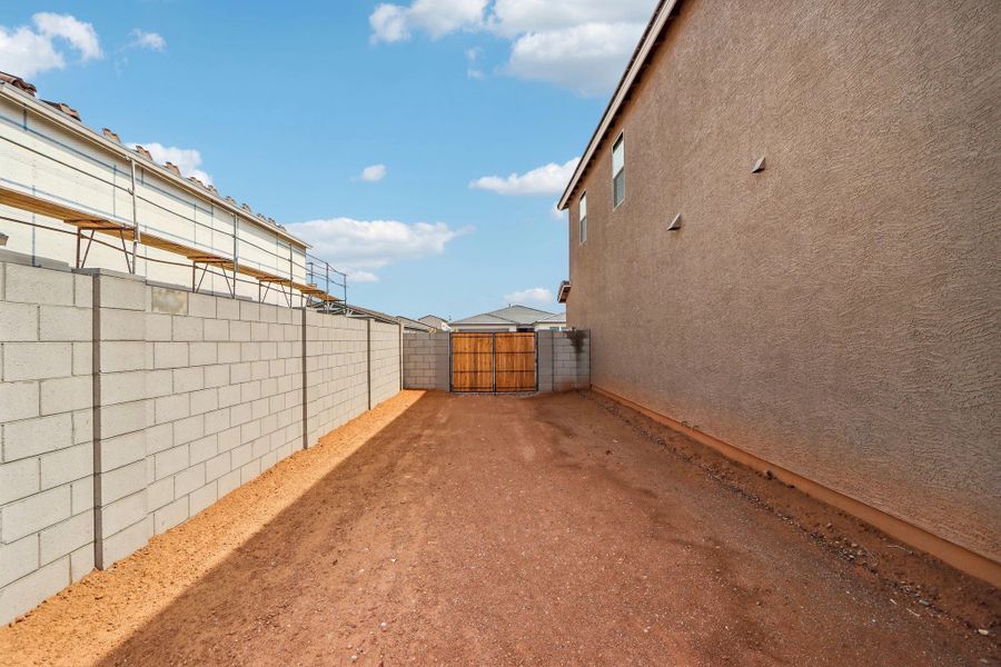 Side yard with double gate Side yard with double gate