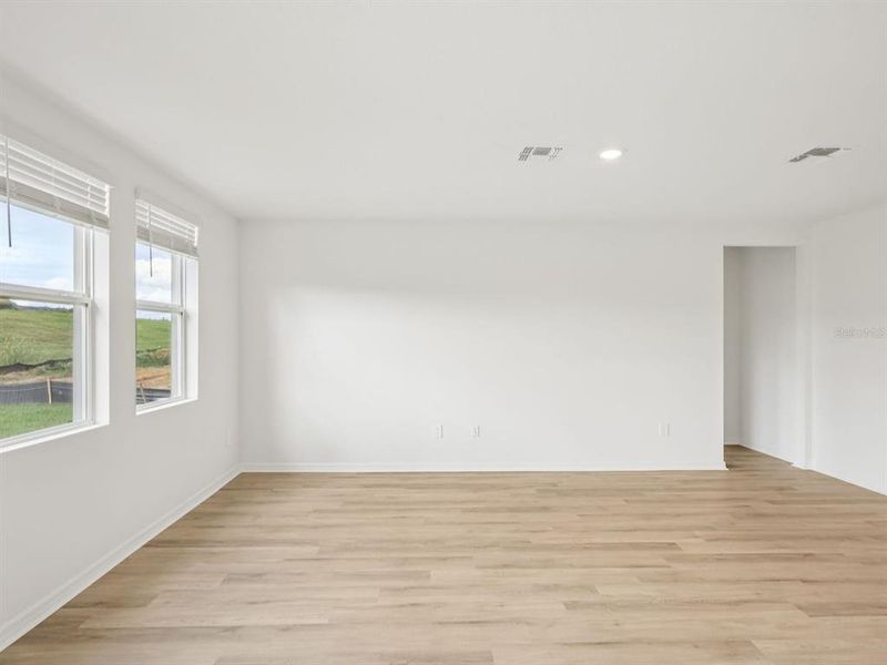 Spacious, unfurnished interior of a new home in The Reserve at Van Oaks, Auburndale (Image 13).