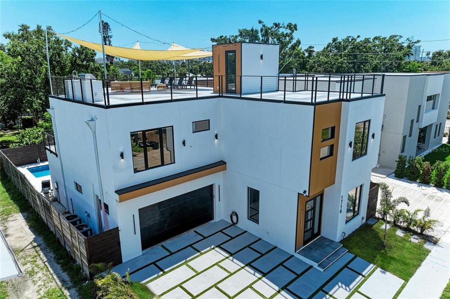 Front exterior of a new home in , Sarasota, FL, highlighting curb appeal (Image 25).