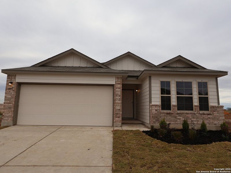 Front exterior of a new home in Meadows at Clear Springs, New Braunfels, TX, highlighting curb appeal (Image 17).