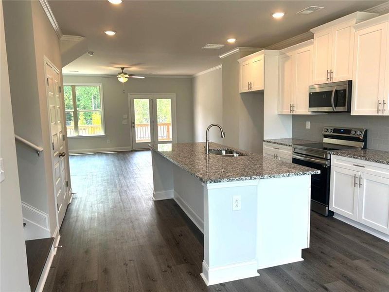 Furnished interior view inside a new home in Towns at Enclave, Lawrenceville (Image 5).