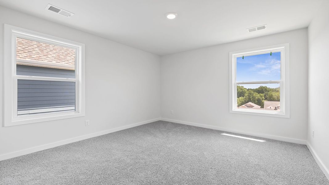Spacious, unfurnished interior of a new home in Adams Glen, Greenville (Image 22).