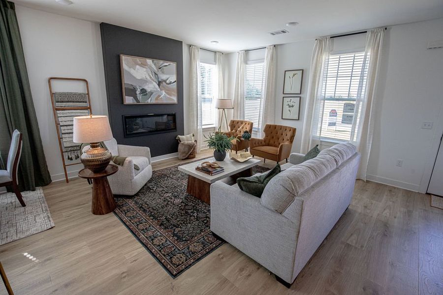 Representative furnished interior of a home built from the Provost by Grant & Co in The Townhomes at Union Depot, Bartlett (Image 8).