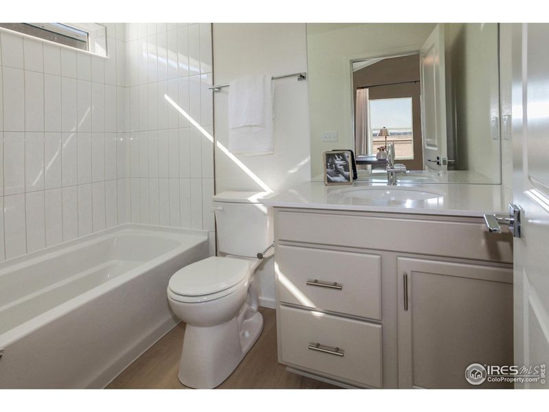 Furnished interior view inside a new home in Prairie Song Cottages, Windsor (Image 10).