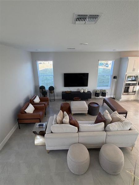 Furnished interior view inside a new home in Center Lake on the Park, St. Cloud (Image 18).