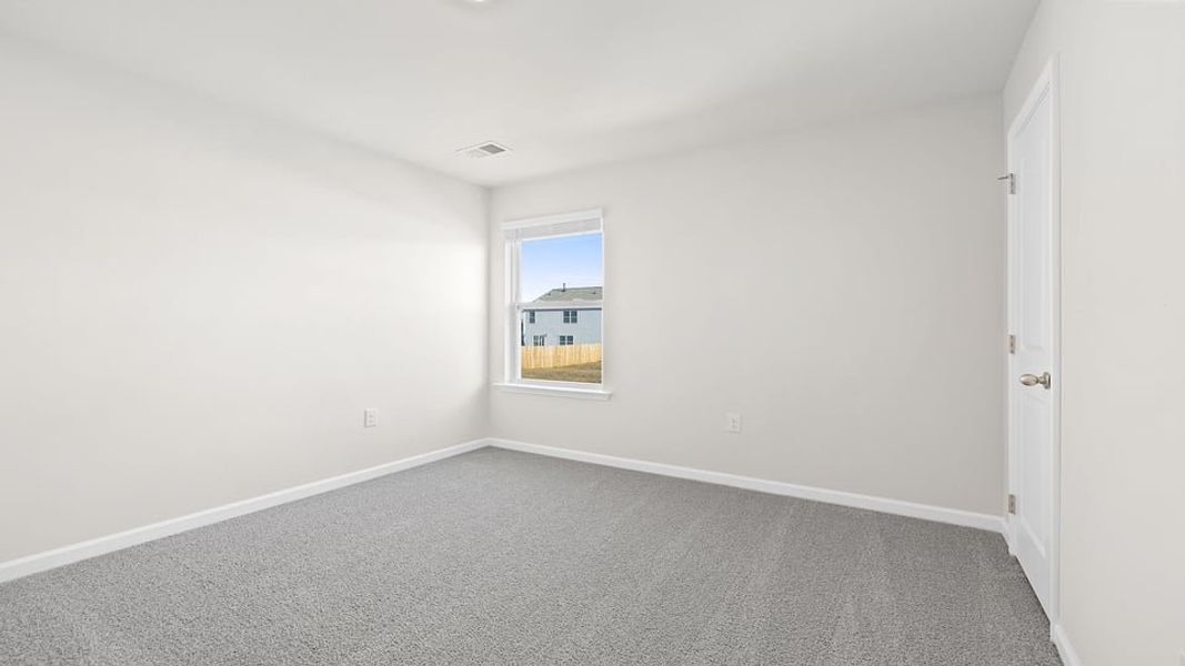 Spacious, unfurnished interior of a new home in Lightwood Cottages, Moore (Image 22).
