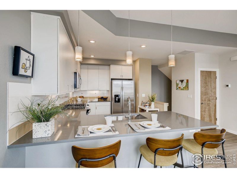 10 foot ceilings on the main level. Photos are of the model home.