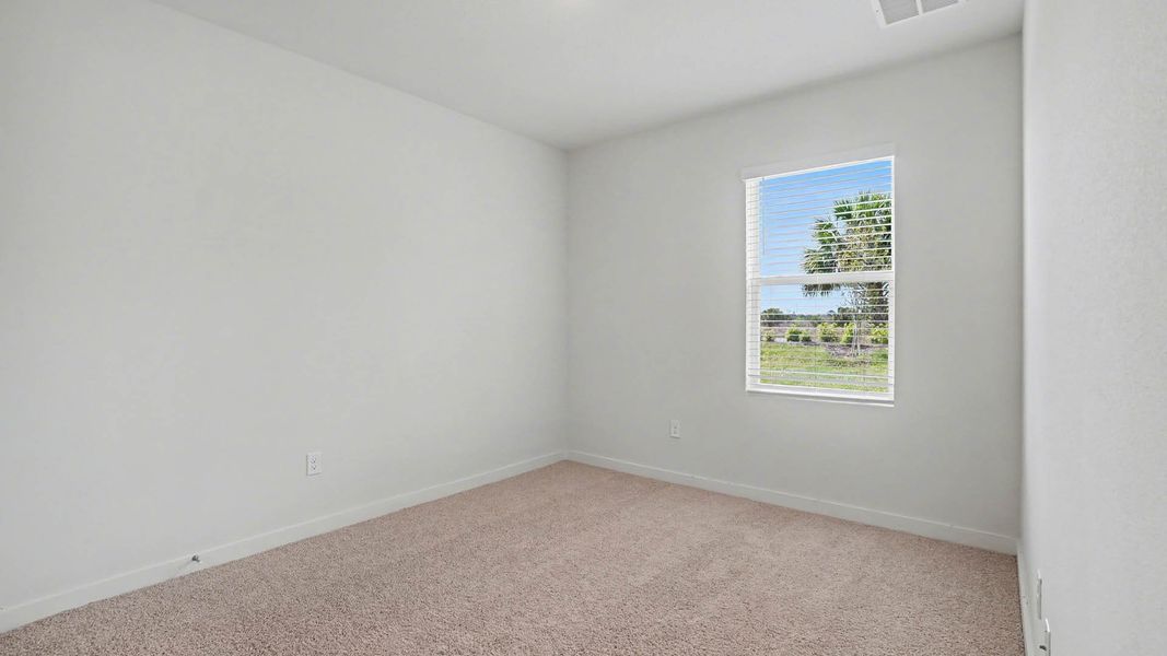 Spacious, unfurnished interior of a new home in Venetian Grove, Vero Beach (Image 17).