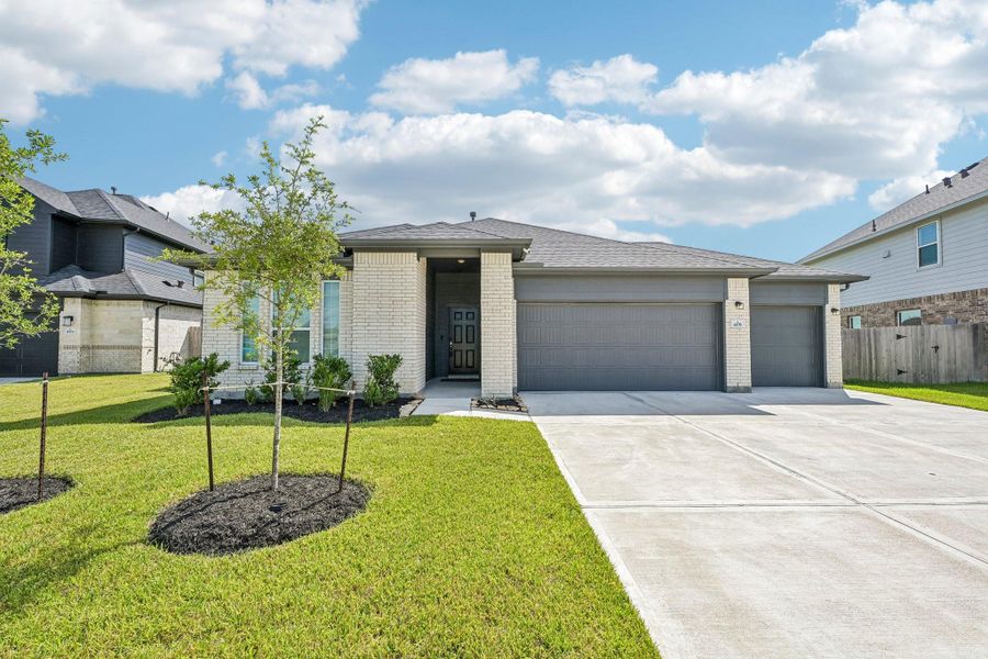 Front exterior of a new home in , Alvin, TX, highlighting curb appeal (Image 2). Front exterior of a new home in , Alvin, TX, highlighting curb appeal (Image 2).