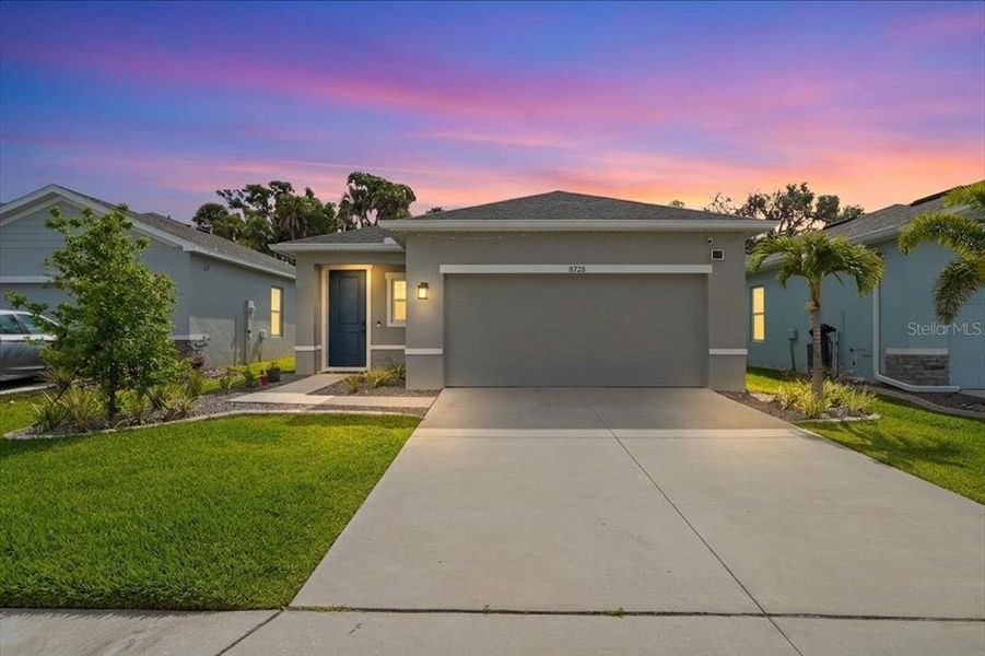 Front exterior of a new home in , Parrish, FL, highlighting curb appeal (Image 23).