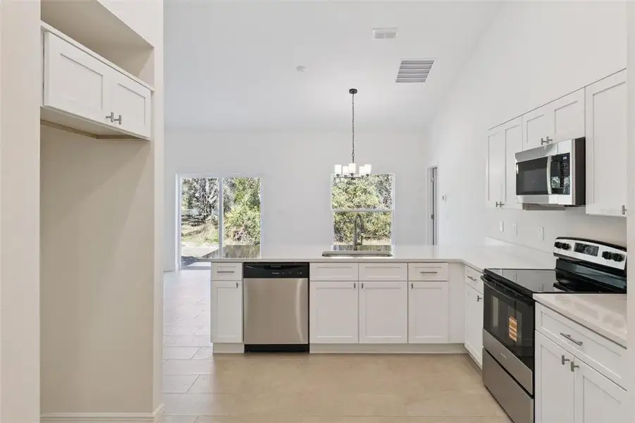 Furnished interior view inside a new home in , Yeehaw Junction (Image 9). Furnished interior view inside a new home in , Yeehaw Junction (Image 9).