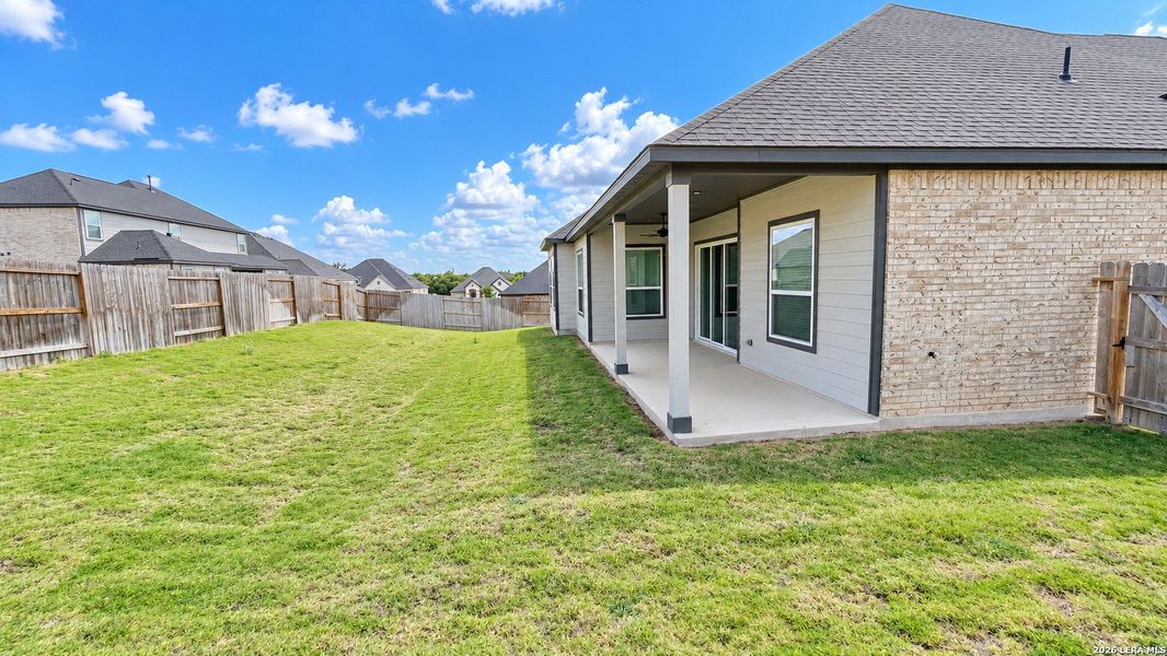 Exterior details and patio area of a home in Potranco West, Castroville (Image 3).
