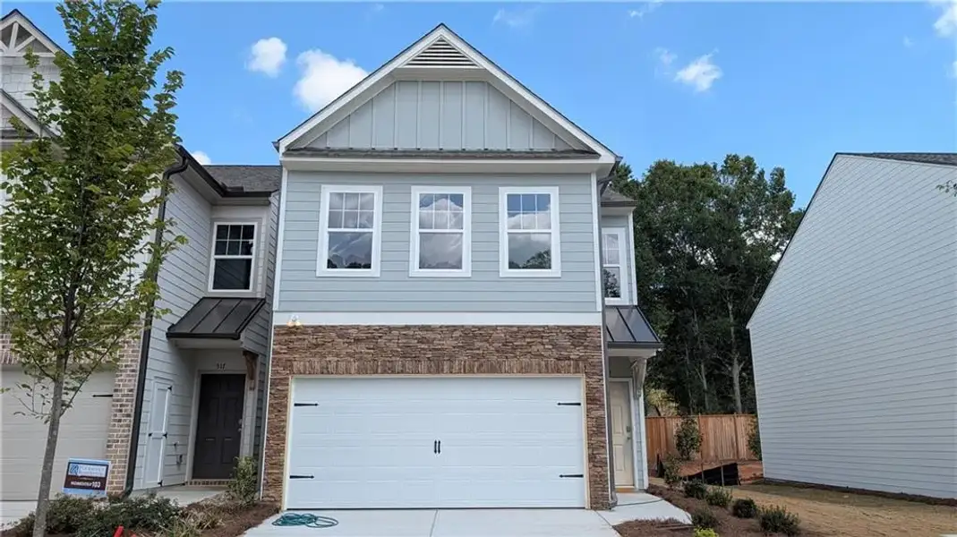 Front exterior of a new home in Owen Preserve, Canton, GA, highlighting curb appeal (Image 2). Front exterior of a new home in Owen Preserve, Canton, GA, highlighting curb appeal (Image 2).