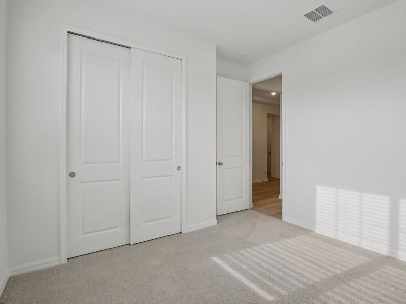 Spacious, unfurnished interior of a new home in Coasterra - Reserve Series, Palmetto (Image 11).