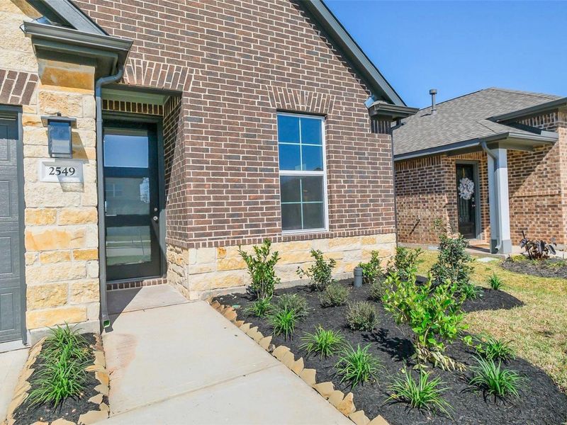 Exterior details and patio area of a home in Sunterra, Katy (Image 3).