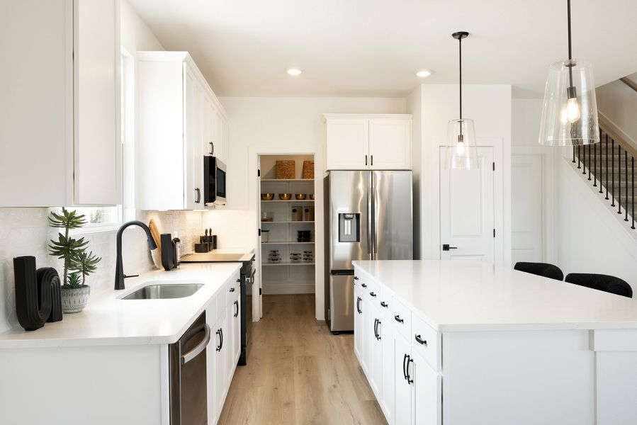 Furnished interior view inside a new home in Freedom at Anthem, Kyle (Image 5).