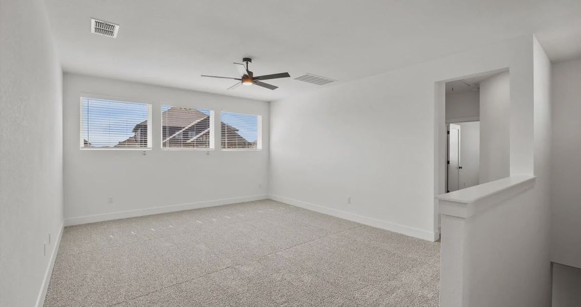 Representative unfurnished interior of a home built from the Courtney by Chesmar Homes in Sunfield, Buda (Image 9). Representative unfurnished interior of a home built from the Courtney by Chesmar Homes in Sunfield, Buda (Image 9).