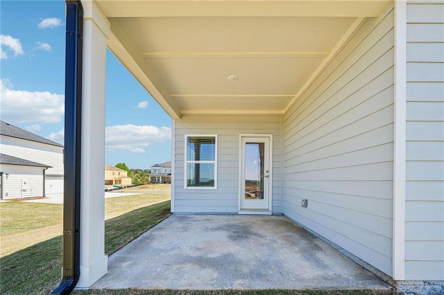 Exterior details and patio area of a home in River Pointe, Monroe (Image 24).