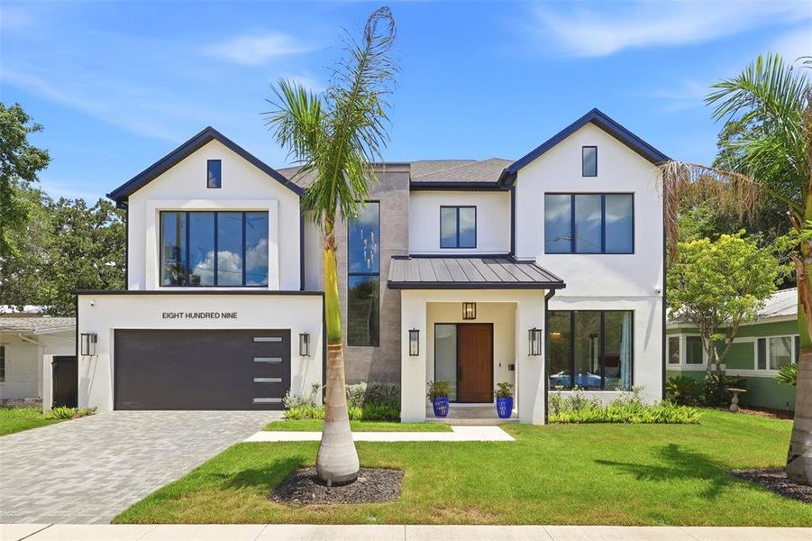 Front exterior of a new home in , Orlando, FL, highlighting curb appeal (Image 2). Front exterior of a new home in , Orlando, FL, highlighting curb appeal (Image 2).