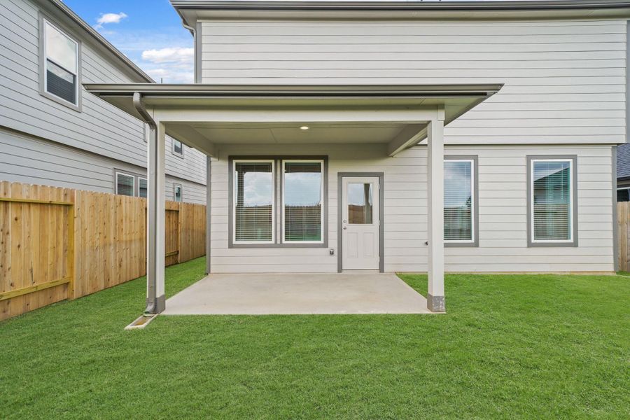 Exterior details and patio area of a home in , Houston (Image 1). Exterior details and patio area of a home in , Houston (Image 1).