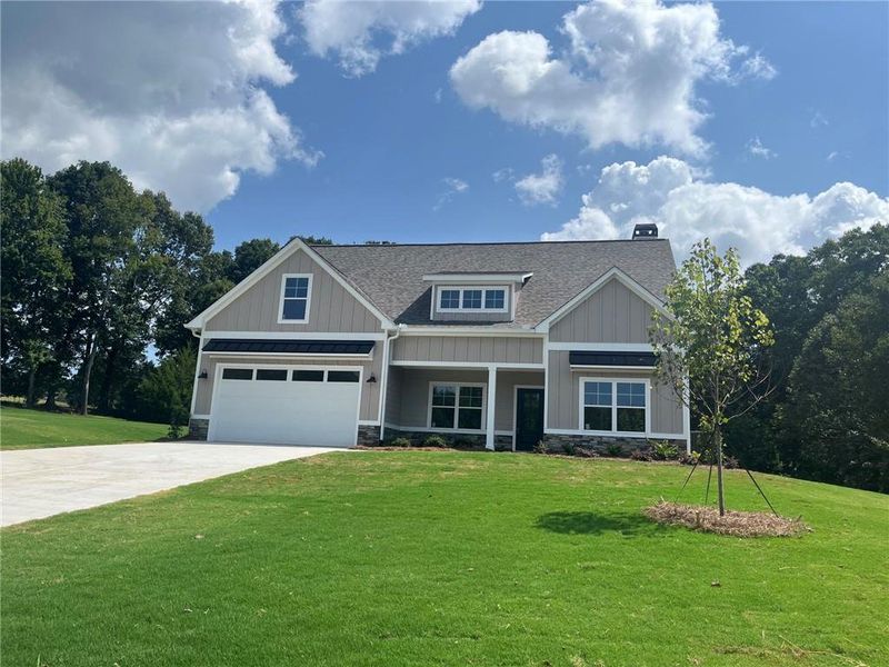 Front exterior of a new home in , Clermont, GA, highlighting curb appeal (Image 20). Front exterior of a new home in , Clermont, GA, highlighting curb appeal (Image 20).