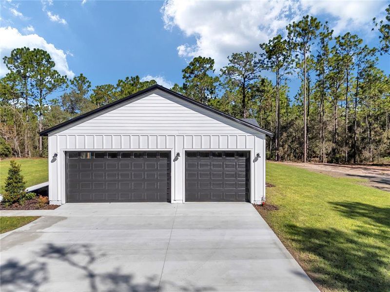 Front exterior of a new home in , Dunnellon, FL, highlighting curb appeal (Image 2).