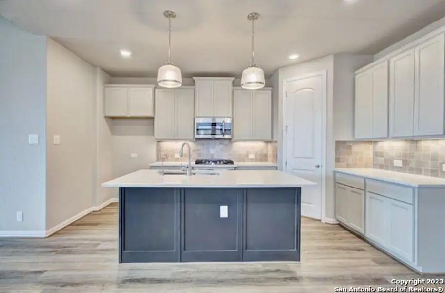 Furnished interior view inside a new home in Stream Waters, Seguin (Image 1).