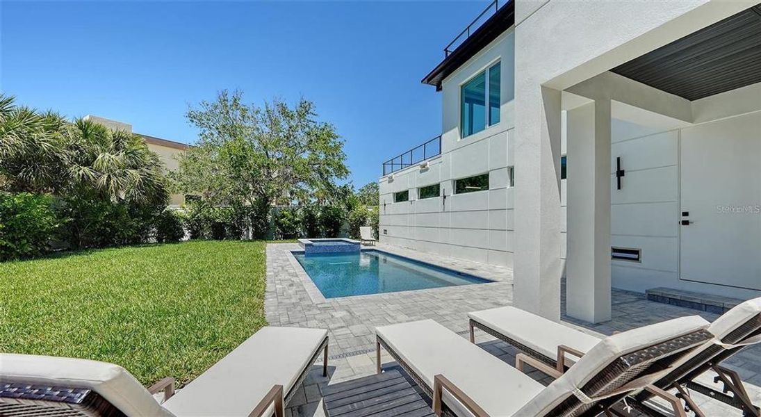 Exterior details and patio area of a home in , Sarasota (Image 33).