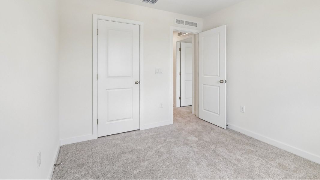 Furnished interior view inside a new home in Cyrene at Harmony, St. Cloud (Image 24).