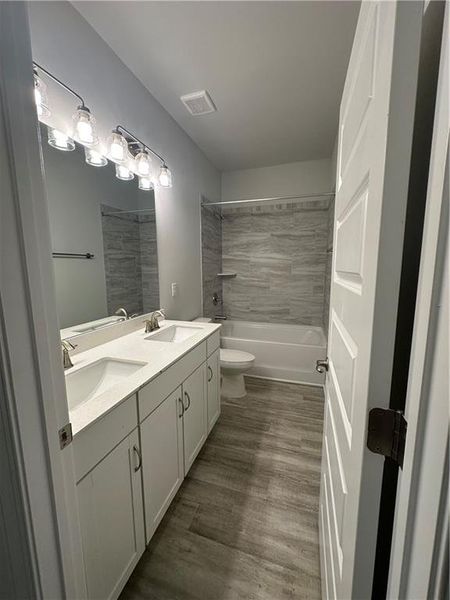 Furnished interior view inside a new home in Mirror Lake, Villa Rica (Image 6).