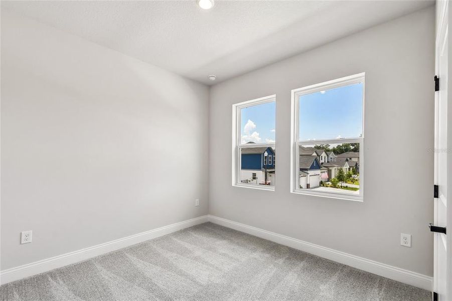 Spacious, unfurnished interior of a new home in Oakfield at Mount Dora Village Series, Mount Dora (Image 40).