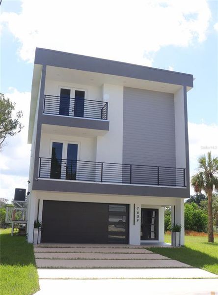 Front exterior of a new home in , Port Richey, FL, highlighting curb appeal (Image 22).