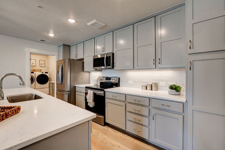 Representative furnished interior of a home built from the The Cambridge by Landmark Homes in The Lakes at Centerra, Loveland (Image 10).